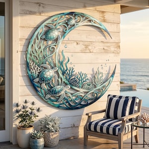 May include: A large, circular metal wall art piece shaped like a crescent moon, featuring intricate cutouts of sea turtles swimming among coral and seaweed. The design is finished in shades of teal, blue, and green, creating a vibrant aquatic scene.