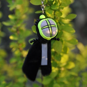 Moderne Motanka Puppe. Motanka Schlüsselanhänger mit kleiner Schleife und reflektierendem Band. Ukrainische Puppe, Schlüsselanhänger, Motanka, Geschenk, Ornament, Ukraine