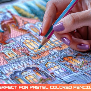 May include: A hand holding a blue pastel colored pencil, coloring a detailed architectural drawing. The drawing features a colorful, intricate design of buildings with windows and balconies. The image is vibrant and showcases the use of pastel pencils.