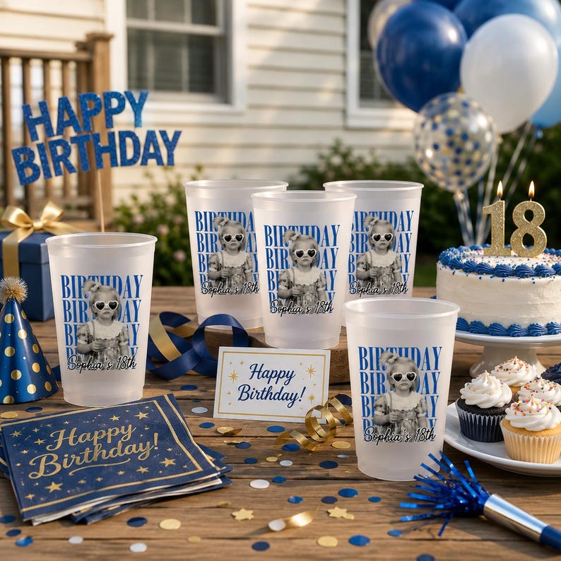 May include: A birthday party scene with blue and gold decorations. Includes frosted plastic cups with a photo and text, a cake with an "18" candle, and a "Happy Birthday" sign. Balloons and confetti complete the festive look.