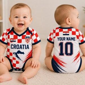 May include: A baby bodysuit featuring a red and white checkered pattern, the text CROATIA, a map graphic, and a small flag on the front. The back displays the text YOUR NAME, the number 10, and a small flag, all in a sports jersey style design.