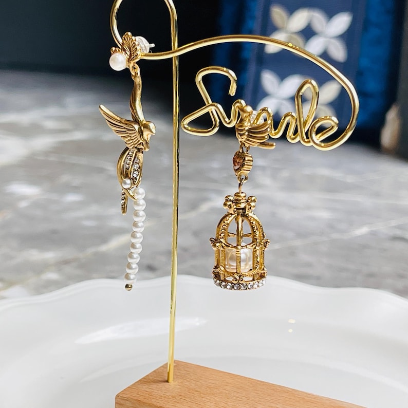 Vintage Birdcage Earrings, Brass and Pearl, Asymmetrical Design, Retro-Inspired Jewelry, Elegant and Stylish, High-Quality Brass, Two Colors, Unique Earrings, Special Occasions, Thoughtful Gift, Distinctive Accessories, Birdcage and Pearl Design