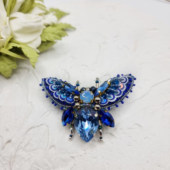 Broche épingle a nourrice strass papillon - Montres & Bijoux