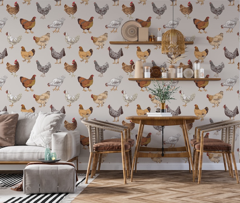 May include: A dining room with a light grey wallpaper featuring a repeating pattern of brown and white chickens. The room has a wooden table with four chairs, a grey sofa, and a grey ottoman.