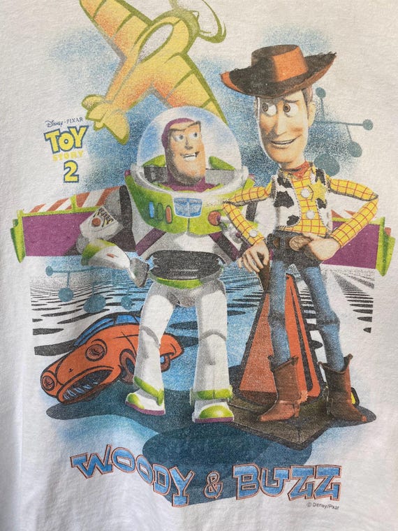 トイ・ストーリー2 Tシャツ バズ・ライトイヤー ウッディ　ヴィンテージ ヴィンテージ トイ・ストーリー2 Tシャツ、ヴィンテージ バズ・ライト