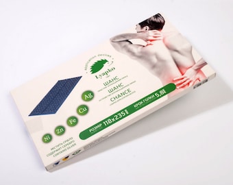 May include: A blue and white application device with the text "Lyapko" and "SHANS CHANCE" printed on it. The device is made of metal and has a grid pattern. The device is packaged in a white box with a green and white design. The box also features a picture of a person with a red back, suggesting the device is for pain relief.