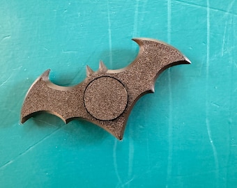Spinner antiestrés impreso en 3D inspirado en el Batarang