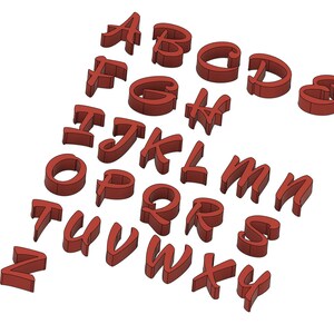 May include: A set of 26 red plastic letters in a stylized font. The letters are arranged in a random pattern on a white background.