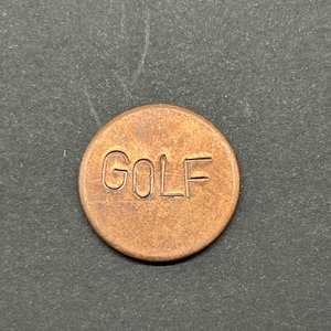 Hand stamped copper golf ball mark