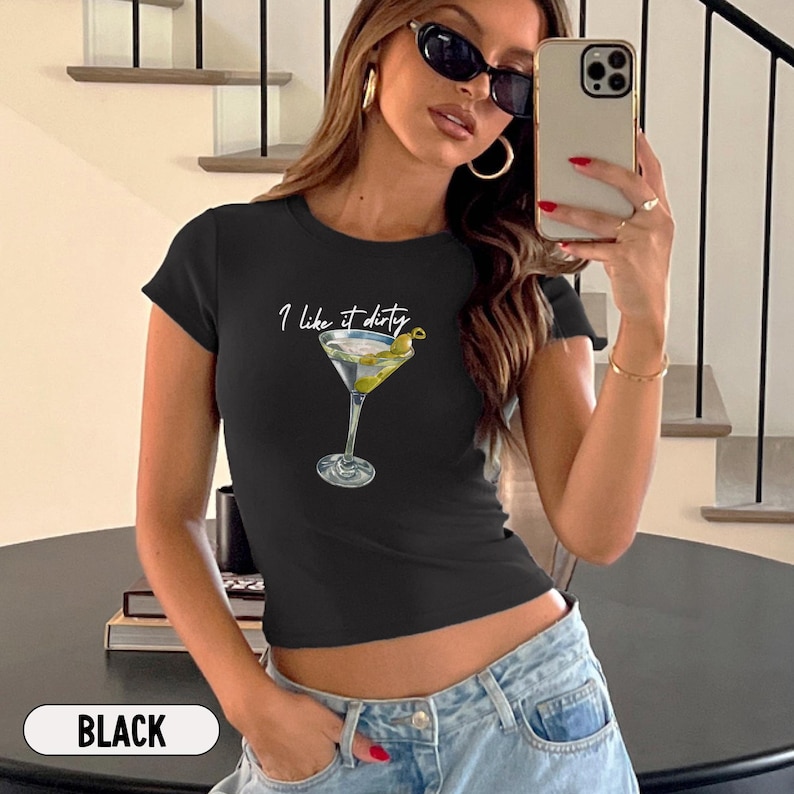 May include: Black cropped t-shirt with a white graphic of a martini glass and the text "I like it dirty".