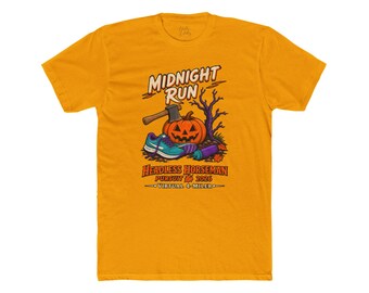 May include: A mustard yellow t-shirt featuring a graphic with the text MIDNIGHT RUN, HEADLESS HORSEMAN PURSUIT 2026 VIRTUAL 4-MILER. The design includes a jack-o'-lantern with an axe, a teal running shoe, a purple water bottle, and a bare tree.