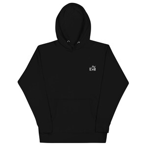 May include: Black hooded sweatshirt with a front pocket and drawstring hood. The white text "Did Evil" is embroidered on the upper right chest. A casual, comfortable garment for everyday wear.