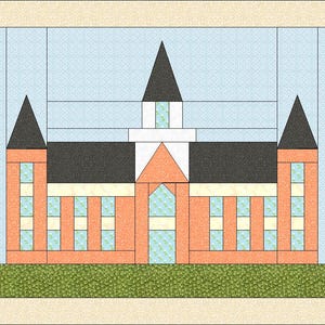 May include: A quilt block pattern depicting a schoolhouse building with orange brick walls, dark gray roofs, and light blue windows. The design features a central tower, two side towers, and a green ground base, all framed by a cream border with pink corners.