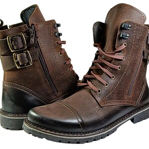 Detailed close-up of fine stitching and natural leather grain on handcrafted men’s ankle boots made in Poland.