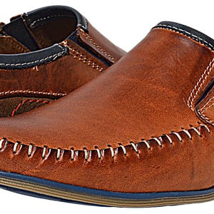 Polish-made men’s leather moccasins, combining luxury craftsmanship with modern style.
