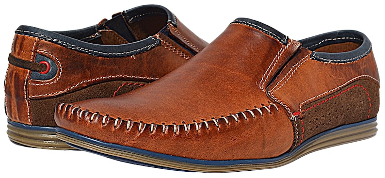 Polish-made men’s leather moccasins, combining luxury craftsmanship with modern style.