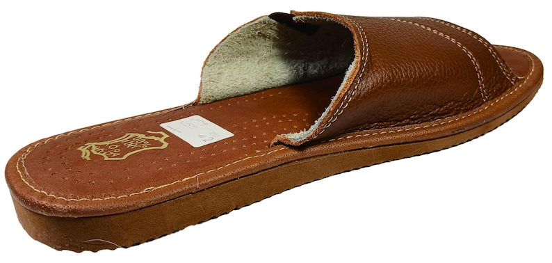 Elegant handcrafted men’s slippers made in Poland using traditional techniques.