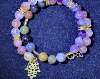 Fire quartz, amethyst, and ocean jasper memory wire bangle with Hansa charm