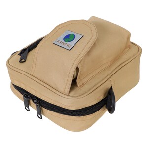 May include: A tan canvas camera bag with a black zipper and a small pocket on the front. The pocket has a logo that says "PANGEA" with a globe graphic.