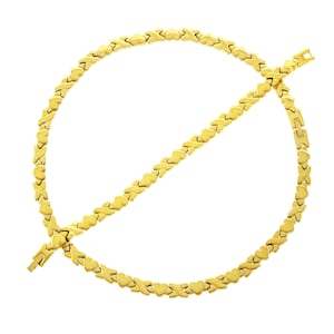 May include: A gold necklace and bracelet set with a heart and X design.