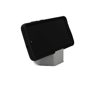 May include: A black phone case with a screen protector is propped up on a gray 3D printed stand.