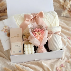 Romantic gift box for her with peach dried flower bouquet, ceramic mug, 
candle, and hand cream — cute gift set for women or girlfriend