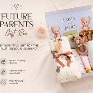 May include: A gift box for future parents, featuring a white box with the names "Emma and James" and teddy bear illustrations. Inside, a baby blanket, rattle, mug, and other items are visible. The text reads "Future Parents Gift Box."