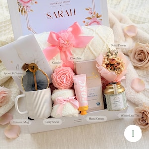 Personalized birthday gift box for her with custom name card, peach 
dried flower bouquet, fluffy blanket, ceramic mug, and rose hand cream