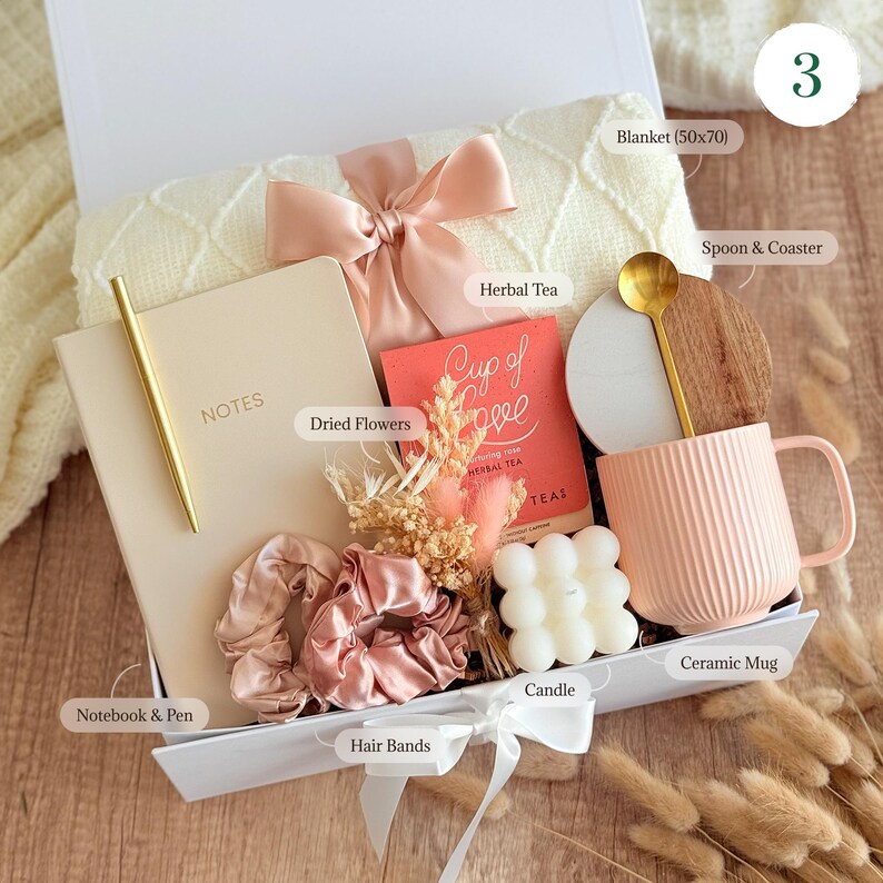 Self care gift box for women with aromatherapy candle, cozy socks, skincare treats, perfect hygge gift basket