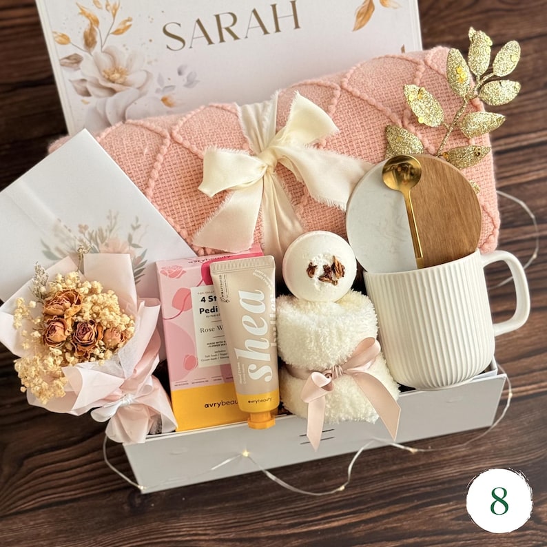 Romantic pink gift box for her with chocolate bar, candle, dried flower 
bouquet, and ceramic mug — gift for girlfriend or wife