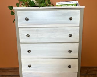 Beautifully finished Modern 5 drawer Chest of drawers painted a Seafoam green with flower accent drawer pulls