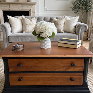Solid Cherry wood coffee table painted with black lacquer, foyer, beautifully restored and refinished, wheels