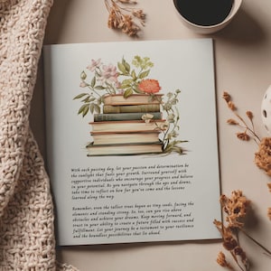 May include: A rectangular print featuring a stack of five books topped with a colorful illustration of pink, orange, and green flowers. Below the books is a paragraph of black text that begins with the words, With each passing day, let your passion.