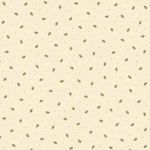May include: A light cream-colored fabric featuring a repeating pattern of small, dark olive green leaves interspersed with tiny, evenly spaced dark olive green dots across the entire surface of the textile material.