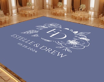 May include: A blue dance floor with a white floral design and the text "Estelle & Drew 05.25.2024" in a white font.