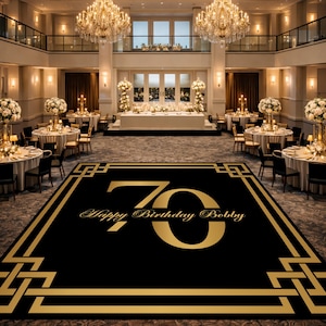 May include: A large ballroom decorated for a 70th birthday celebration. A black dance floor with gold trim and the text "70 Happy Birthday Bobby" is in the foreground. Tables with white tablecloths and floral centerpieces are set up.
