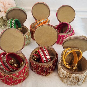 May include: A rustic wooden sign with the text "Welcome to our home" in a handwritten style. The sign features a distressed finish and a simple, inviting design, perfect for a front porch or entryway.