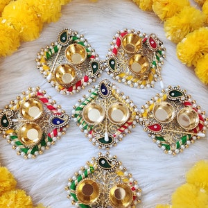 Lot of 100 Handcrafted Square Haldi Kumkum Plate Return gifts for pooja, housewarming. Multi Color with Tilak stick.