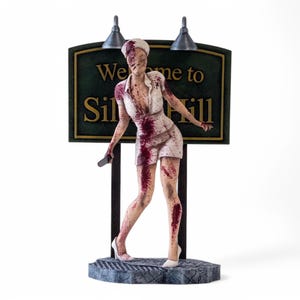 May include: A set of three ceramic mugs with a speckled, matte finish. The mugs are in shades of cream, light gray, and dark gray. Each mug has a simple, minimalist design, perfect for coffee or tea.