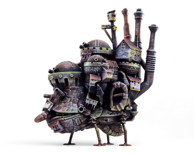 Le château émouvant hurle du Studio Ghiblis | Hayao Miyazaki | Mangas | Animés | chiffre du château à pied | statue de château ambulante