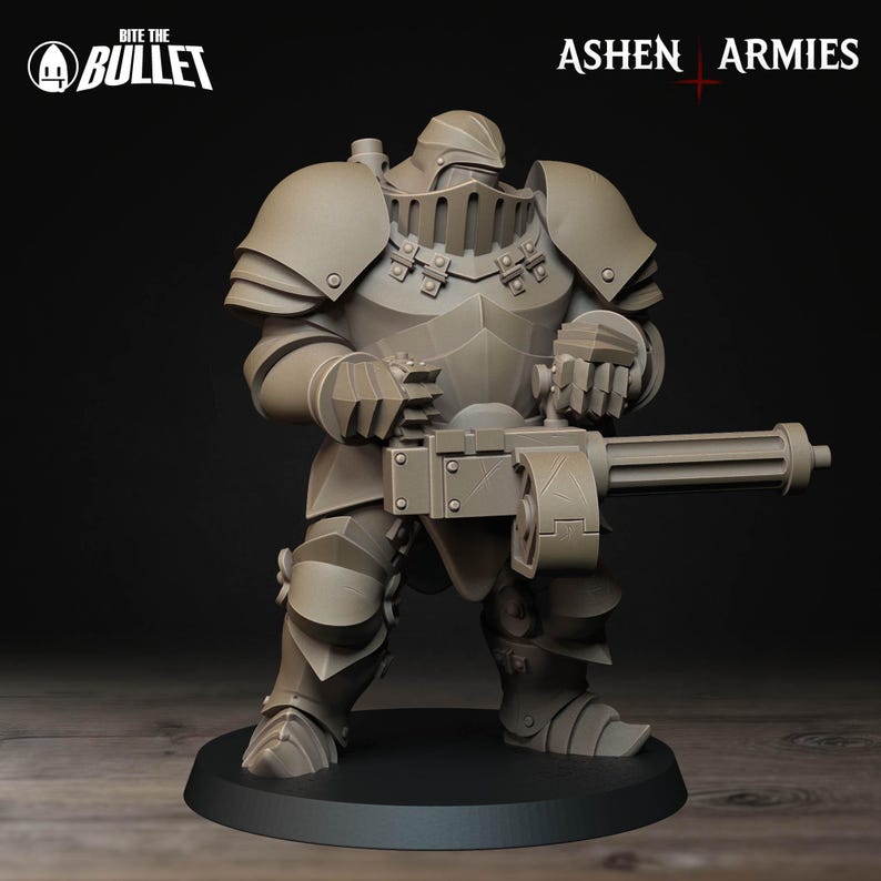 May include: A detailed, gray miniature figure of a heavily armored warrior holding a large machine gun. The figure is standing on a black base. The text "Bite the Bullet" and "Ashen Armies" are visible.