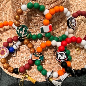 Llaveros de pulsera ganadores de partidos, Universidad de Miami, Universidad de Florida, Universidad Estatal de Florida, FAMU, USF, B-CU, fútbol universitario