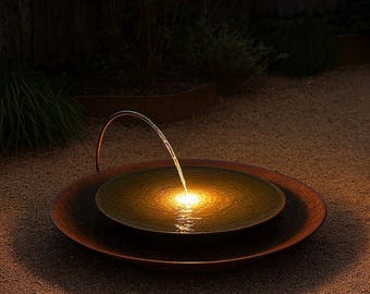 Fuente moderna para pájaros con acabado de cobre rústico e iluminación LED