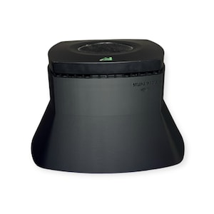 May include: A black speaker with a round, black speaker grille on top. The speaker has a small green light on the top and the text "SHARP RF-B45" on the front.