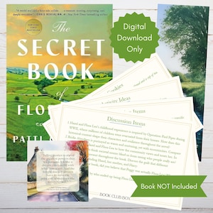 May include: A book club box for "The Secret Book of Flora Lea" by Patti Callahan Henry. The box includes discussion questions, activity ideas, and a book not included. The book cover features a green and blue landscape with a white farmhouse.
