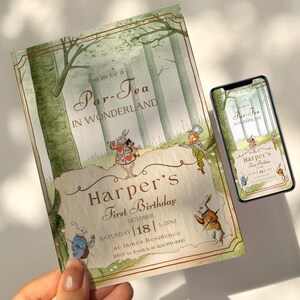 May include: An Alice in Wonderland themed birthday party invitation. The invitation features illustrations of characters from the story, including the White Rabbit and the Mad Hatter, with the text "Par-Tea in Wonderland" and "Harper's First Birthday". A smartphone displays the same design.