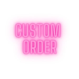 May include: Pink neon sign with the text "CUSTOM ORDER" on a white background.