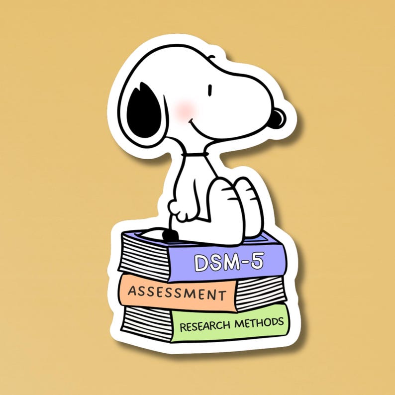 May include: A white cartoon dog with black ears and a black nose sits atop a stack of three books. The top book is purple and labeled DSM-5, the middle book is peach labeled ASSESSMENT, and the bottom book is green labeled RESEARCH METHODS.