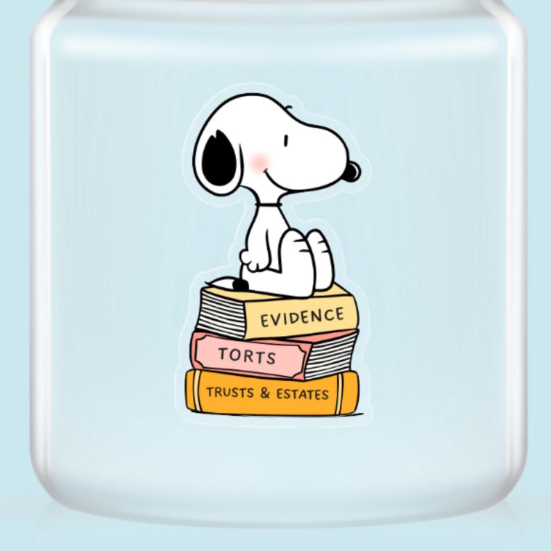 May include: A white cartoon dog sits atop a stack of books labeled "Evidence", "Torts", and "Trusts & Estates". The books are yellow and pink. The background is a light blue.