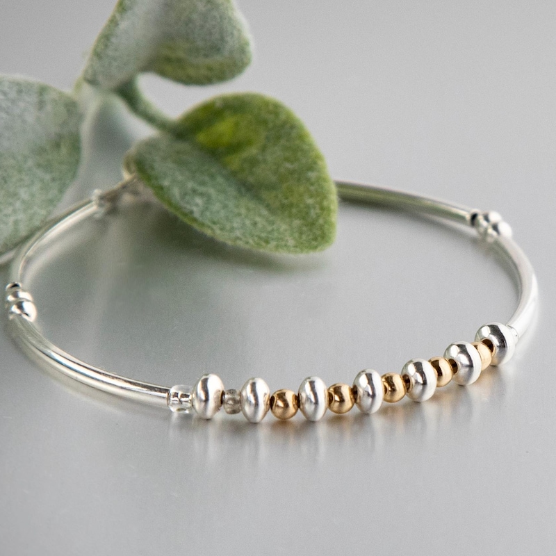 Beautiful Gold and Silver Intertwined Bracelet. main image 1